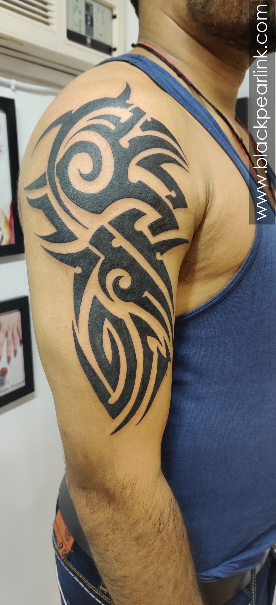 Classic Tribal Tattoo on Bicep