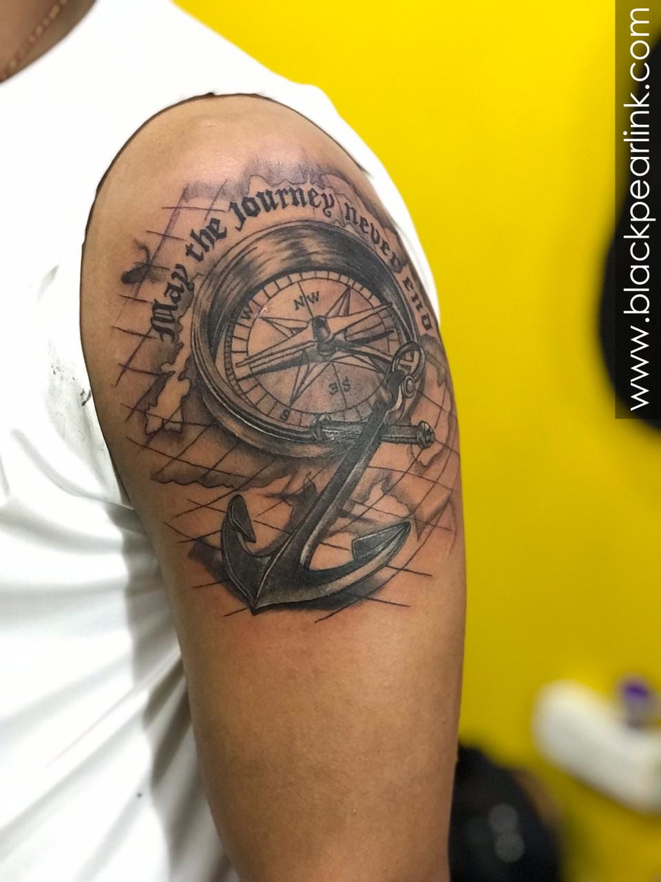 compass tattoo with anchor