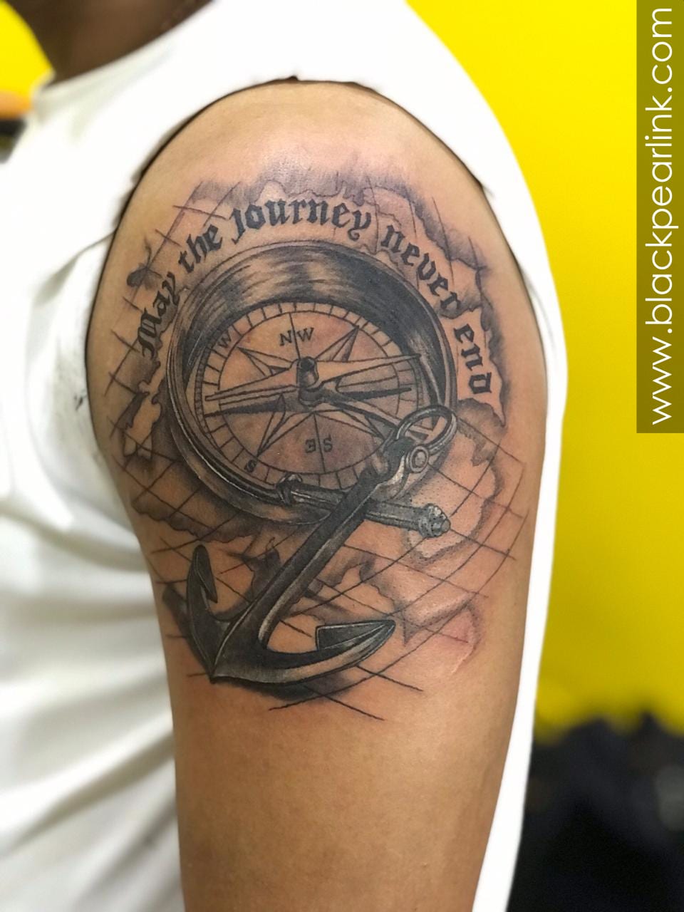 compass tattoo with anchor