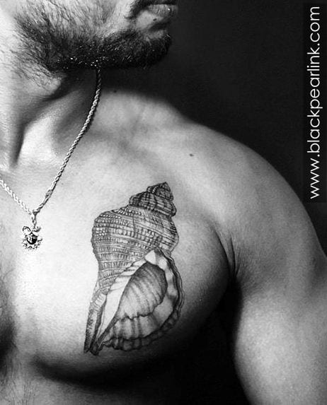 Conch Tattoo on Chest with Intricate Details