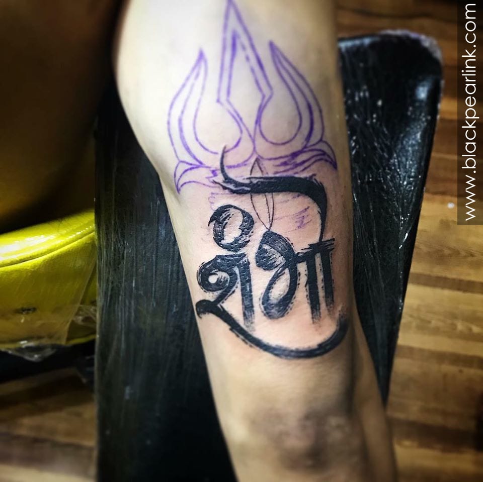 Graceful Trishul tattoos for Lord Shiva devotees Graceful Trishul tattoos for Lord Shiva devotees