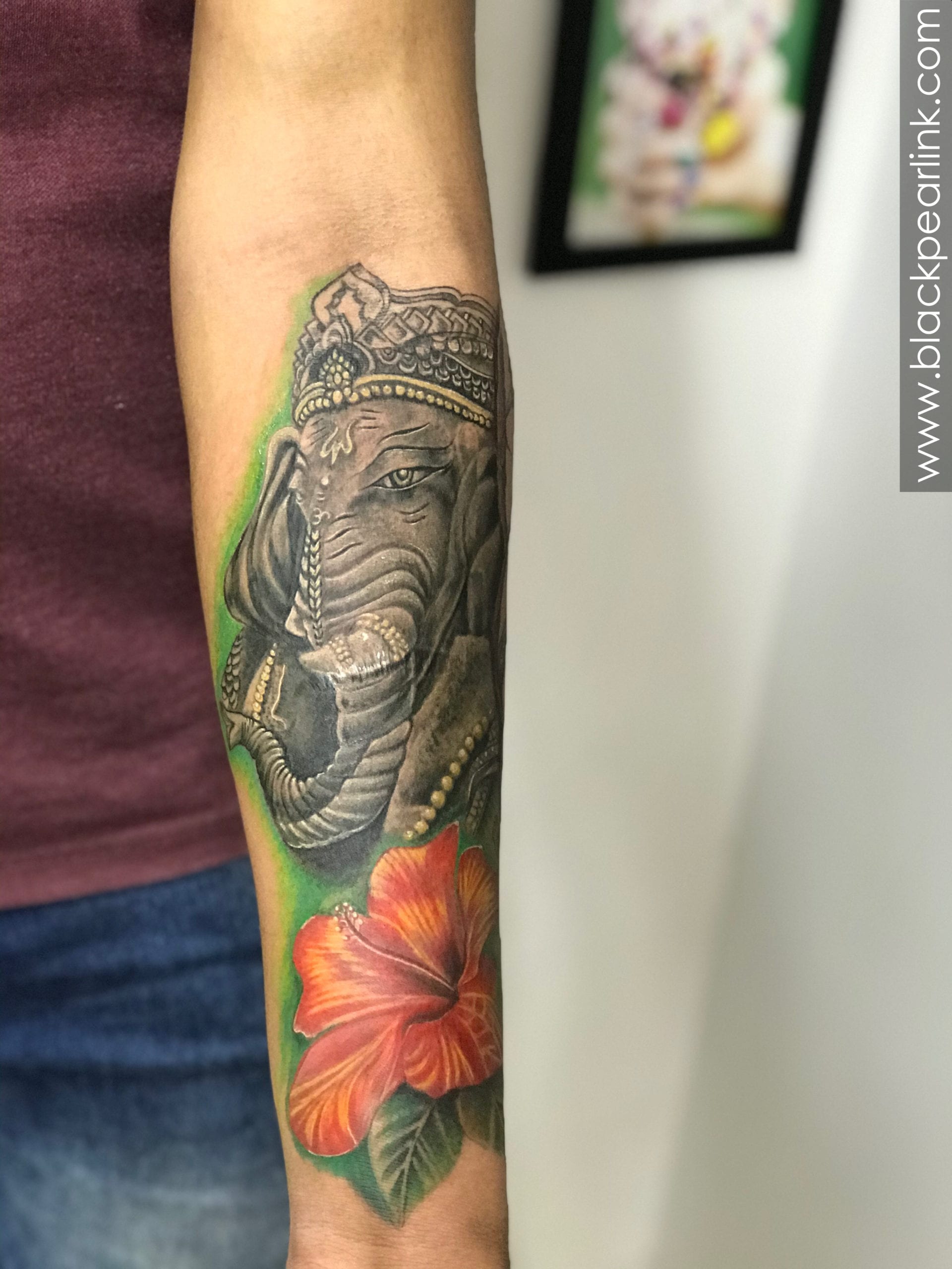 Statuesque Ganesha Tattoo on Forearm