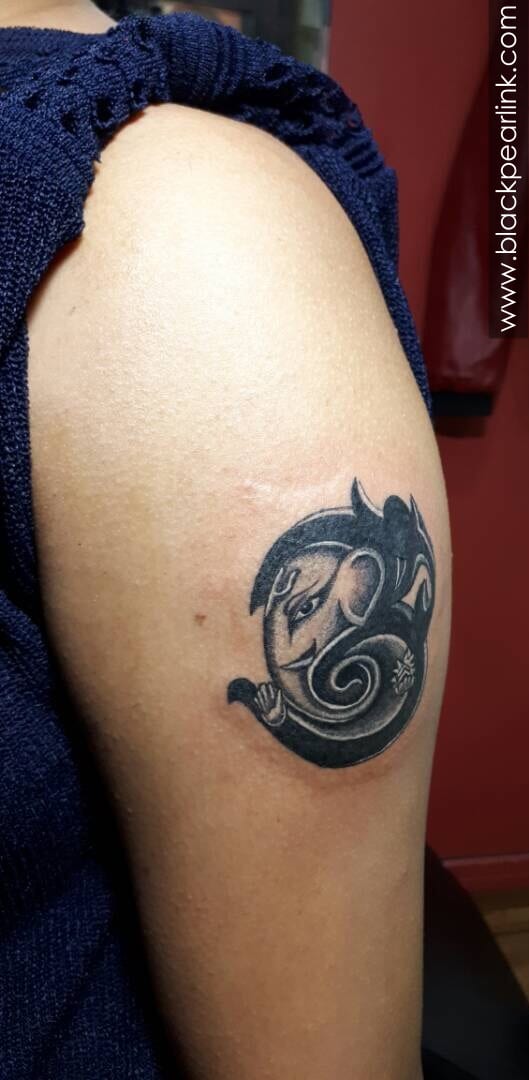 Why do people get Ganesha tattoo? - Ace Tattooz